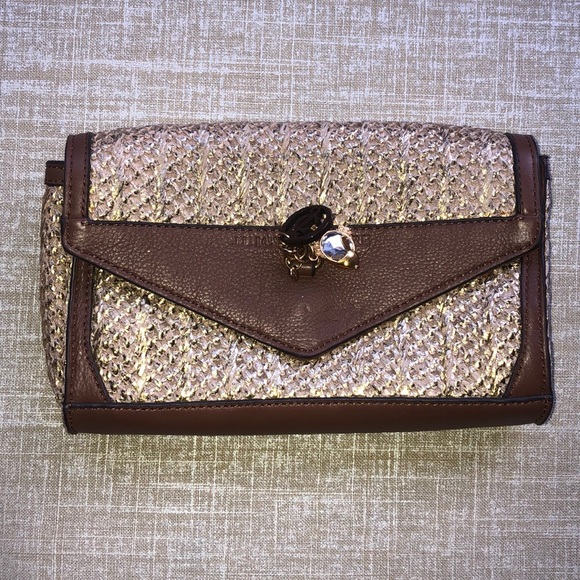 Juicy Couture Handbags - Juicy Couture charm gold metallic brushed clutch. Hot pink inside